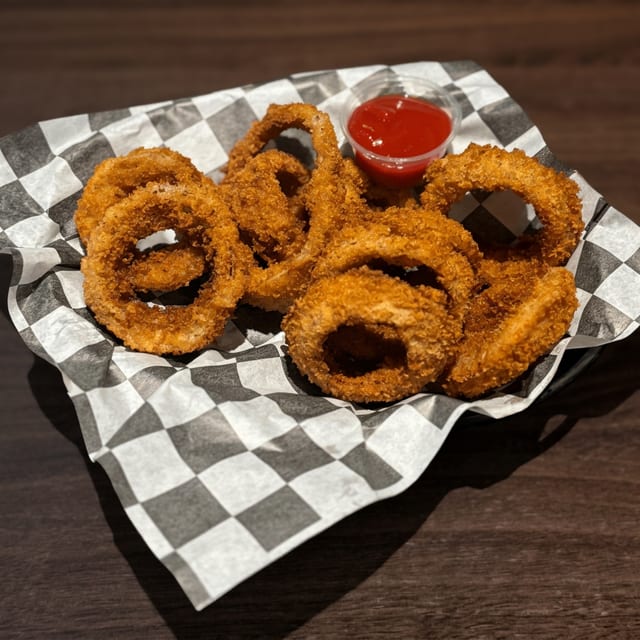 Hand Breaded Onion Rings.